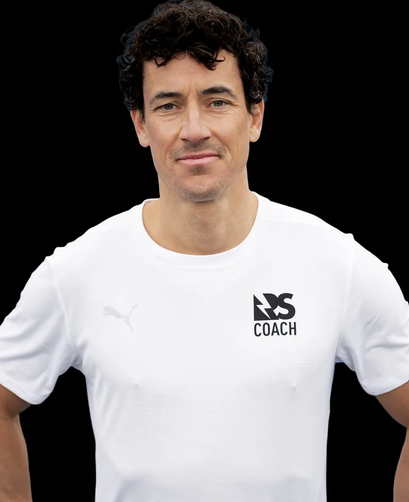 Portrait of Benjamin Mauerberger in his running coach shirt