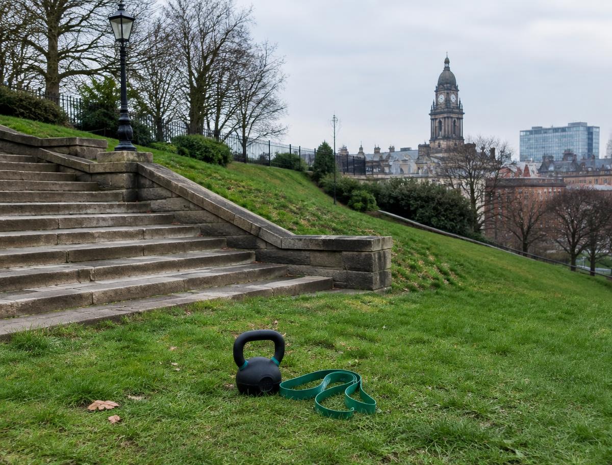 Green space and stone steps above Leeds city centre, used for outdoor fitness sessions